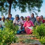 Amitié Fleur, jasmine pickers posing