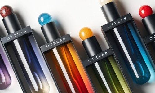 Otzlab x Metapack: A perfume bottle suspended in a metal frame