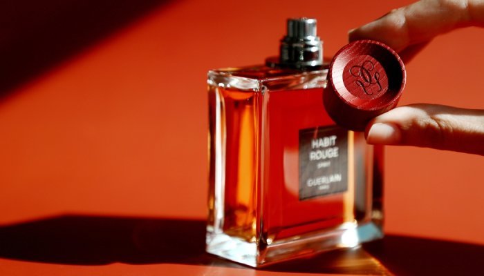 Quadpack creates a luxury wood cap for Guerlain's Habit Rouge Spirit