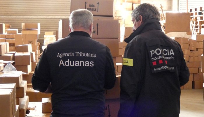 Catalan police shut down counterfeit perfume plant making millions of bottles