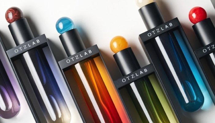 Otzlab x Metapack: A perfume bottle suspended in a metal frame